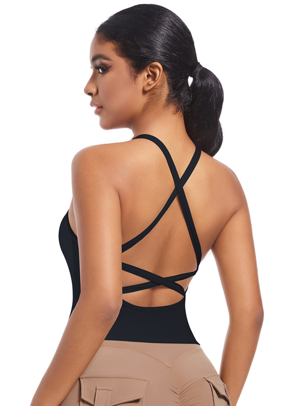 Flexvibe sports bra waistband detail showing cross back and seamless activewear design